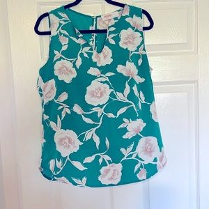 Renee C green flowered sleeveless blouse size M